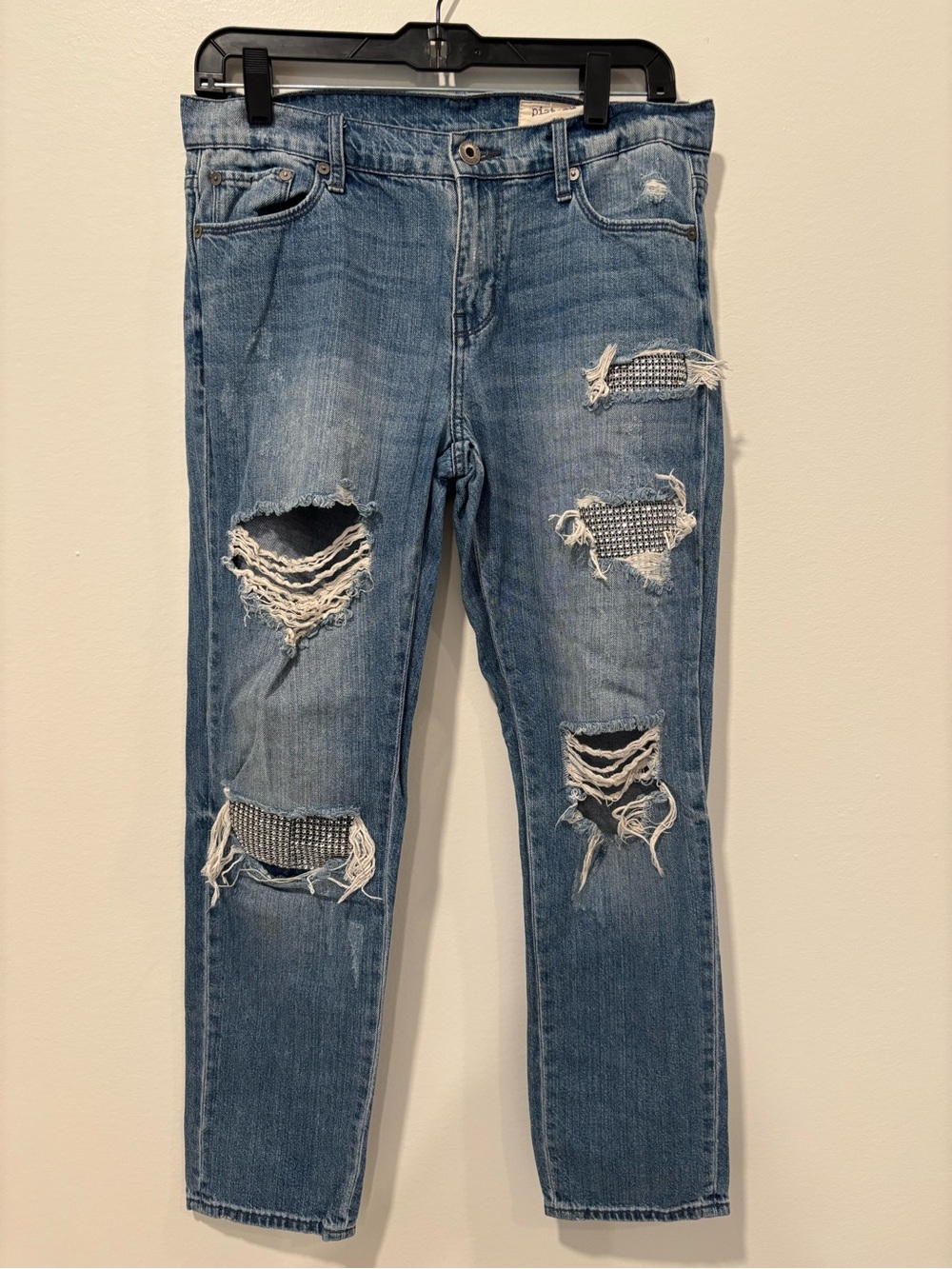 Distressed Women's Blue Denim Jeans with Embellished Rips